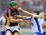 24 July 2016; Jake Dillon of Waterford in action against Matthew O’Hanlon of Wexford during the GAA Hurling All-Ireland Senior Championship quarter final match between Wexford and Waterford at Semple Stadium in Thurles, Co Tipperary.