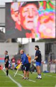 24 July 2016; Waterford manager Derek McGrath, and selector Dan Shanahan, issue instructions as Kilkenny manager Brian Cody appears on the big screen during the GAA Hurling All-Ireland Senior Championship quarter final match between Wexford and Waterford at Semple Stadium in Thurles, Co Tipperary.
