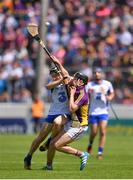 24 July 2016; Jamie Barron of Waterford in action against Eoin Conroy of Wexford during the GAA Hurling All-Ireland Senior Championship quarter final match between Wexford and Waterford at Semple Stadium in Thurles, Co Tipperary. Photo by Stephen McCarthy/Sportsfile