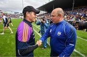 24 July 2016; Wexford manager Liam Dunne, left, and Waterford manager Derek McGrath following the GAA Hurling All-Ireland Senior Championship quarter final match between Wexford and Waterford at Semple Stadium in Thurles, Co Tipperary. Photo by Stephen McCarthy/Sportsfile