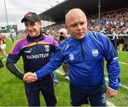 24 July 2016; Wexford manager Liam Dunne, left, and Waterford manager Derek McGrath following the GAA Hurling All-Ireland Senior Championship quarter final match between Wexford and Waterford at Semple Stadium in Thurles, Co Tipperary. Photo by Stephen McCarthy/Sportsfile