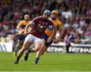 24 July 2016; Conor Cooney of Galway goes past Cian Dillon of Clare on his way to scoring his sides first goal during the GAA Hurling All-Ireland Senior Championship quarter final match between Clare and Galway at Semple Stadium in Thurles, Co Tipperary. Photo by Ray McManus/SPORTSFILE