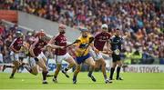 24 July 2016; David McInerney of Clare in action against Galway players, left to right, Conor Whelan, Conor Cooney and Jason Flynn during the GAA Hurling All-Ireland Senior Championship quarter final match between Clare and Galway at Semple Stadium in Thurles, Co Tipperary. Photo by Daire Brennan/Sportsfile