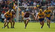 24 July 2016; Johnny Coen of Galway in action against Shane O'Donnell, left, Colm Galvin and Tony Kelly of Clare during the GAA Hurling All-Ireland Senior Championship quarter final match between Clare and Galway at Semple Stadium in Thurles, Co Tipperary. Photo by Ray McManus/Sportsfile