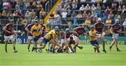 24 July 2016; Johnny Coen of Galway and David McInerney of Clare break away from the crowd during the GAA Hurling All-Ireland Senior Championship quarter final match between Clare and Galway at Semple Stadium in Thurles, Co Tipperary. Photo by Daire Brennan/Sportsfile