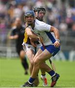 24 July 2016; Patrick Curran of Waterford in action against Eoin Moore of Wexford during the GAA Hurling All-Ireland Senior Championship quarter final match between Wexford and Waterford at Semple Stadium in Thurles, Co Tipperary. Photo by Daire Brennan/Sportsfile