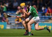 24 July 2016; Damien Reck of Wexford in action against Ronan Connelly of Limerick during the Electric Ireland GAA Hurling All-Ireland Minor Championship quarter final match between Wexford and Limerick at Semple Stadium in Thurles, Co Tipperary. Photo by Ray McManus/Sportsfile