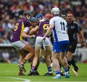 24 July 2016; Patrick Curran of Waterford in action against Jack O'Connor, left, and Paudie Foley of Wexford during the GAA Hurling All-Ireland Senior Championship quarter final match between Wexford and Waterford at Semple Stadium in Thurles, Co Tipperary. Photo by Daire Brennan/Sportsfile