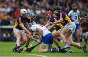 24 July 2016; Austin Gleeson of Waterford in action against Wexford players, left to right, Liam Ryan, Paudie Foley, and Eoin Conroy, during the GAA Hurling All-Ireland Senior Championship quarter final match between Wexford and Waterford at Semple Stadium in Thurles, Co Tipperary. Photo by Daire Brennan/Sportsfile