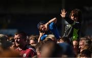 24 July 2016; Young supporters try to get on television as Joe Canning of Galway is interviewed following the GAA Hurling All-Ireland Senior Championship quarter final match between Clare and Galway at Semple Stadium in Thurles, Co Tipperary. Photo by Stephen McCarthy/Sportsfile