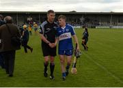 2 July 2016; Referee Barry Kelly shakes hands with Podge Collins of Clare after the GAA Hurling All-Ireland Senior Championship Round 1 match between Clare and Laois at Cusack Park in Ennis, Co Clare. Photo by Piaras Ó Mídheach/Sportsfile