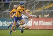 2 July 2016; Shane O'Donnell of Clare in action against Enda Rowland of Laois during the GAA Hurling All-Ireland Senior Championship Round 1 match between Clare and Laois at Cusack Park in Ennis, Co Clare. Photo by Piaras Ó Mídheach/Sportsfile