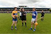 2 July 2016; Referee Barry Kelly performs the coin toss with team captains Tony Kelly of Clare, left, and Charles Dwyer of Laois prior to the GAA Hurling All-Ireland Senior Championship Round 1 match between Clare and Laois at Cusack Park in Ennis, Co Clare. Photo by Piaras Ó Mídheach/Sportsfile