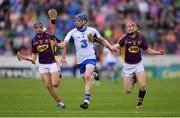 24 July 2016; Austin Gleeson of Waterford in action against Eanna Martin, left, and Diarmuid O’Keeffe of Wexford during the GAA Hurling All-Ireland Senior Championship quarter final match between Wexford and Waterford at Semple Stadium in Thurles, Co Tipperary. Photo by Stephen McCarthy/Sportsfile