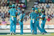 24 July 2016; St Lucia Zouks celebrate the wicket of Nic Maddinson during Match 23 of the Hero Caribbean Premier League match between St Lucia Zouks and Guyana Amazon Warriors at the Daren Sammy Cricket Stadium in Gros Islet, St Lucia. Photo by Ashley Allen/Sportsfile