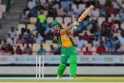 24 July 2016; Guyana Amazon Warriors batsman Chris Lynn hits six during Match 23 of the Hero Caribbean Premier League match between St Lucia Zouks and Guyana Amazon Warriors at the Daren Sammy Cricket Stadium in Gros Islet, St Lucia. Photo by Ashley Allen/Sportsfile