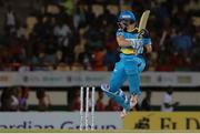 24 July 2016; Shane Watson cuts for four during Match 23 of the Hero Caribbean Premier League match between St Lucia Zouks and Guyana Amazon Warriors at the Daren Sammy Cricket Stadium in Gros Islet, St Lucia. Photo by Ashley Allen/Sportsfile