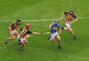 5 September 2010; Eoin Kelly, Tipperary, in action against Jackie Tyrrell, left, John Tennyson and John Dalton, Kilkenny. GAA Hurling All-Ireland Senior Championship Final, Kilkenny v Tipperary, Croke Park, Dublin. Picture credit: Brendan Moran / SPORTSFILE