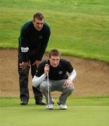 17 September 2010; Barry Anderson and his caddie Aidan Anderson, County Sligo Golf Club, Co. Sligo, line up a putt on the 11th green during the Bulmers Senior Cup Semi-Final. Bulmers Cups and Shields Finals 2010, Castlebar Golf Club, Co. Mayo. Picture credit: Ray McManus / SPORTSFILE