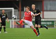 18 September 2010; Daniel North, St Patrick's Athletic, in action against Ronan Finn, Sporting Fingal. FAI Ford Cup Quarter-Final, St. Patrick's Athletic v Sporting Fingal, Richmond Park, Inchicore, Dublin. Picture credit: Barry Cregg / SPORTSFILE