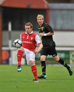 18 September 2010; Daniel North, St Patrick's Athletic, in action against Ronan Finn, Sporting Fingal. FAI Ford Cup Quarter-Final, St. Patrick's Athletic v Sporting Fingal, Richmond Park, Inchicore, Dublin. Picture credit: Barry Cregg / SPORTSFILE