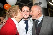 19 September 2010; Republic of Ireland U17 player Jennifer Byrne, from Athlone, gets a kiss from her grandparents Maureen and Terry Byrne as she arrived home at Dublin Airport after her team's defeat to Japan in the Quarter-Finals of the FIFA U17 Women’s World Cup in Trinidad & Tobago. Dublin Airport, Dublin. Photo by Sportsfile