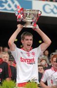19 September 2010; Conan Grugan, Tyrone, lifts the cup. ESB GAA Football All-Ireland Minor Championship Final, Cork v Tyrone, Croke Park, Dublin. Picture credit: Ray McManus / SPORTSFILE