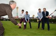 25 July 2016; Two-time National Hunt Champion Jockey Davy Russell, second from left, pictured with hurlers, from left, John Tennyson, Richie Power and Tommy Walsh as trainer Jim Bolger tosses the sliotar in to promote Hurling for Cancer Research Charity match to be held in St Conleth's Park, Newbridge on Tuesday August 9 at 6:30 pm at the Galway Races in Ballybrit, Co Galway. Photo by Cody Glenn/Sportsfile
