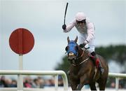 25 July 2016; Barry Browne celebrates winning the Connacht Hotel (Q.R.) Handicap on Swamp Fox at the Galway Races in Ballybrit, Co Galway. Photo by Cody Glenn/Sportsfile