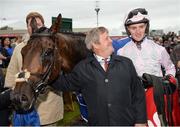 25 July 2016; Trainer Joseph Murphy and jockey Barry Browne celebrate with Swamp Fox after winning the Connacht Hotel (Q.R.) Handicap at the Galway Races in Ballybrit, Co Galway. Photo by Cody Glenn/Sportsfile