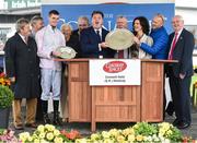 25 July 2016; Trainer Joseph Murphy, far left, jockey Barry Browne, second from left, and the winning connections of Swamp Fox with the trophy after the Connacht Hotel (Q.R.) Handicap at the Galway Races in Ballybrit, Co Galway. Photo by Cody Glenn/Sportsfile