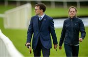 25 July 2016; Trainer Aidan O'Brien walks the course with his daughter jockey Ana O'Brien at the Galway Races in Ballybrit, Co Galway. Photo by Cody Glenn/Sportsfile