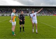 9 July 2016; Referee Pádraig Hughes with team captains Alan Mulhall of Offaly, left, and Eoin Doyle of Kildare prior to the GAA Football All-Ireland Senior Championship - Round 2B match between Kildare and Offaly at St Conleth's Park in Newbridge, Kildare.  Photo by Piaras Ó Mídheach/Sportsfile