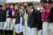 26 July 2016; Pat Smullen, third from right, and fellow jockeys observe a minute of silence for the late jockey John Thomas McNamara after race one at the Galway Races in Ballybrit, Co Galway. Photo by Cody Glenn/Sportsfile