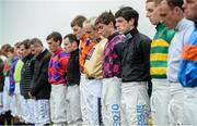 26 July 2016; Ruby Walsh, sixth from right, Jack Kennedy, fifth from right, and fellow jockeys observe a minute of silence for the late jockey John Thomas McNamara after race one at the Galway Races in Ballybrit, Co Galway. Photo by Cody Glenn/Sportsfile