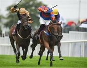 26 July 2016; Eventual winner Talk The Lingo, right, a 66/1 longshot, with Barry Cash up, races alongside Briar Hill, with Ruby Walsh up, who finished second, on their way to winning the Latin Quarter Beginners Steeplechase at the Galway Races in Ballybrit, Co Galway. Photo by Cody Glenn/Sportsfile