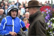 26 July 2016; Ruby Walsh in conversation with trainer Willie Mullins after winning the COLM Quinn BMW Novice Hurdle on Penhill at the Galway Races in Ballybrit, Co Galway. Photo by Cody Glenn/Sportsfile