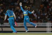26 July 2016; St Lucia Zouks Andre Fletcher (R) and Daren Sammy (L) celebrate the wicket of Dwayne Bravo during the Hero Caribbean Premier League (CPL) Match 24 between St Lucia Zouks and Trinbago Knight Riders at the Daren Sammy Cricket Stadium in Gros Islet, St Lucia. Photo by Ashley Allen/Sportsfile