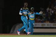 26 July 2016; St Lucia Zouks captain Daren Sammy and Andre Fletcher celebrate the wicket of Brendon McCullum during the Hero Caribbean Premier League (CPL) Match 24 between St Lucia Zouks and Trinbago Knight Riders at the Daren Sammy Cricket Stadium in Gros Islet, St Lucia. Photo by Ashley Allen/Sportsfile