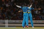 26 July 2016; St Lucia Zouks Daren Sammy (L) and Delorn Johnson (R) celebrate during the Hero Caribbean Premier League (CPL) Match 24 between St Lucia Zouks and Trinbago Knight Riders at the Daren Sammy Cricket Stadium in Gros Islet, St Lucia. Photo by Ashley Allen/Sportsfile