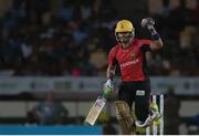 26 July 2016; Trinbago Knight Riders Umar Akmal celebrates victory during the Hero Caribbean Premier League (CPL) Match 24 between St Lucia Zouks and Trinbago Knight Riders at the Daren Sammy Cricket Stadium in Gros Islet, St Lucia. Photo by Ashley Allen/Sportsfile
