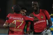 26 July 2016; Trinbago Knight Riders captain Dwayne Bravo (L) congratulates Umar Akmal (C) on his match winning performance during the Hero Caribbean Premier League (CPL) Match 24 between St Lucia Zouks and Trinbago Knight Riders at the Daren Sammy Cricket Stadium in Gros Islet, St Lucia. Photo by Ashley Allen/Sportsfile