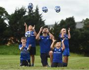 27 July 2016; Rob Kearney of Leinster with participants, left to right, Cillian McCarthy, aged 10, from Walkinstown, Co Dublin, Daniel O'Shea, aged 10, from Lucan, Co Dublin, Adara Carthy, aged 9, from Celbridge, Co Kildare, and Olivia Campbell, aged 9, from Tallaght, Co Dublin, during the Bank of Ireland Leinster Rugby Summer Camp at Clondalkin RFC in Kingswood Cross, Dublin. Photo by Daire Brennan/Sportsfile