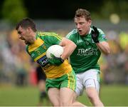 12 June 2016; Paddy McGrath of Donegal in action against Aidan Breen of Fermanagh during their Ulster GAA Football Senior Championship Quarter-Final match between Fermanagh and Donegal at MacCumhaill Park in Ballybofey, Co. Donegal. Photo by Oliver McVeigh/Sportsfile