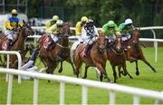 27 July 2016; Eventual winner Our Kylie, second from right, with Danny Mullins up, races alongside Floral Fantasy, far right, with Mark Walsh up, who finished second, and Give Her Bach, with Pierce Gallagher up, who finished third, while Davy Russell falls from Crystal Pearl, as they round the final bend to win the Tote European Breeders Fund Mares Handicap Hurdle at the Galway Races in Ballybrit, Co Galway. Photo by Cody Glenn/Sportsfile