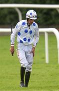 27 July 2016; Davy Russell after a fall from Crystal Pearl in the Tote European Breeders Fund Mares Handicap Hurdle at the Galway Races in Ballybrit, Co Galway. Photo by Cody Glenn/Sportsfile