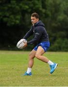 27 July 2016; Leinster Academy player Charlie Rock takes part in a drill with camp participants  during a Leinster Rugby School of Excellence Camp at King's Hospital in Liffey Valley, Dublin.  Photo by Sam Barnes/Sportsfile