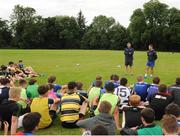 27 July 2016; Leinster Academy players Charlie Rock, right, and Ian Fitzpatrick, left, talk with participants during a Leinster Rugby School of Excellence Camp at King's Hospital in Liffey Valley, Dublin. Photo by Sam Barnes/Sportsfile