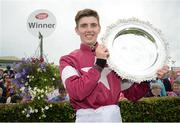 27 July 2016; Donagh Meyler celebrates with the Galway Plate after winning the TheTote.com Galway Plate Steeplechase Handicap at the Galway Races in Ballybrit, Co Galway. Photo by Cody Glenn/Sportsfile