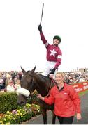 27 July 2016; Donagh Meyler celebrates as he enters the winner's enclosure on Lord Scoundrel after the TheTote.com Galway Plate Steeplechase Handicap at the Galway Races in Ballybrit, Co Galway. Photo by Cody Glenn/Sportsfile